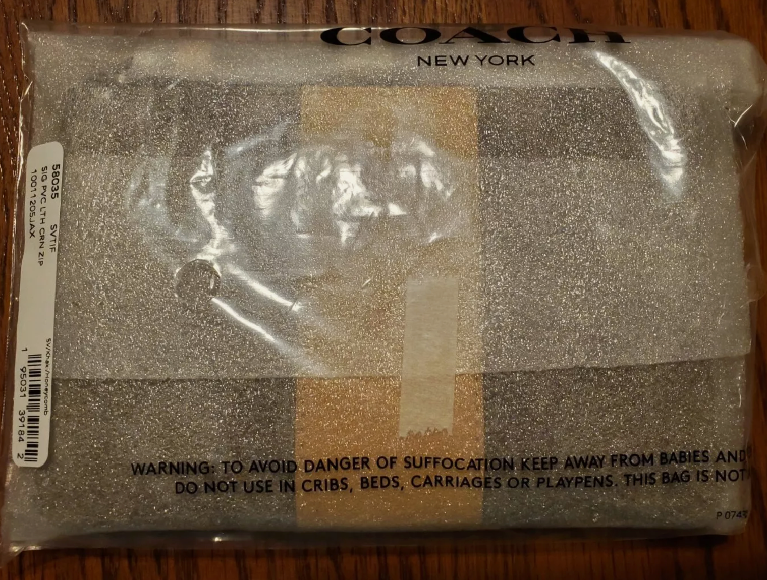 COACH Corner Zip Wristlet